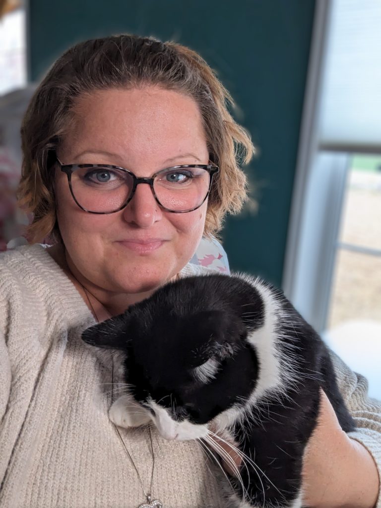 Mikah Hughes with her cat Sir Oreo Puff